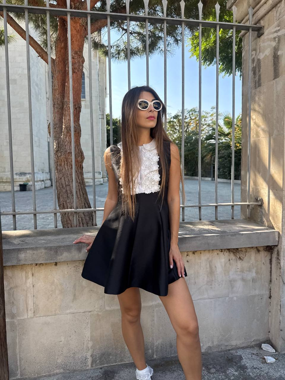Sleeveless mini black dress