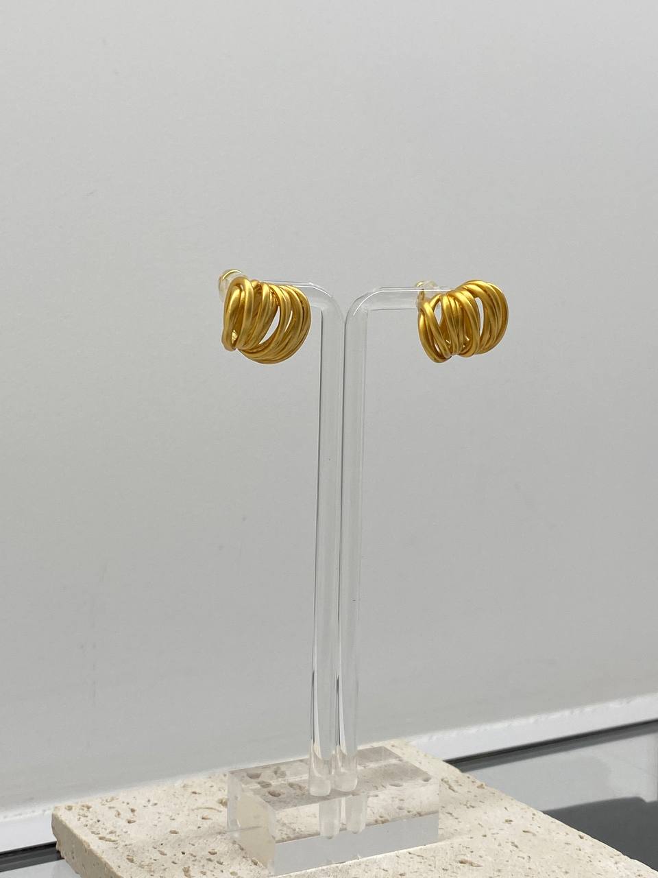 Gold stud earrings