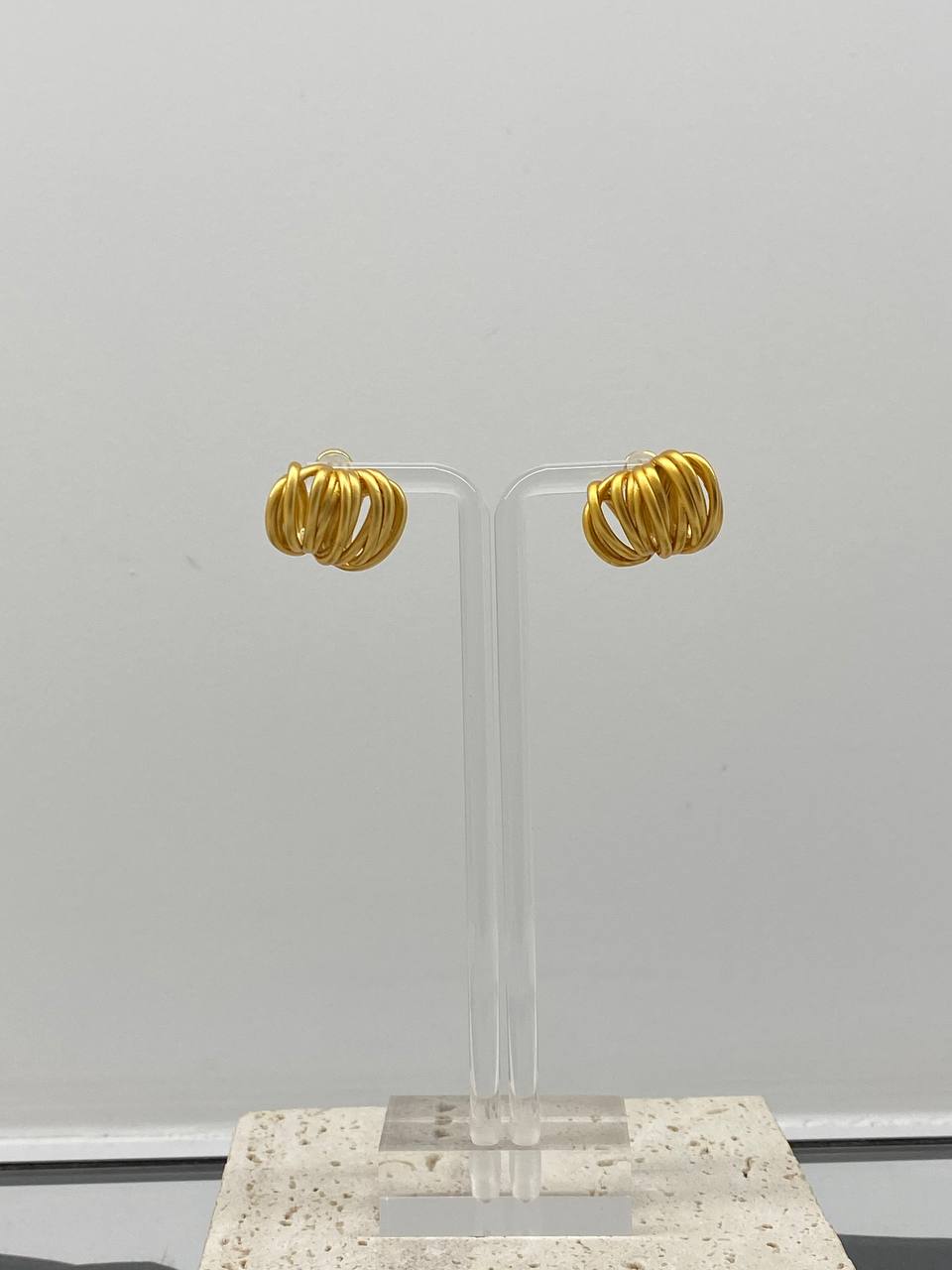 Gold stud earrings
