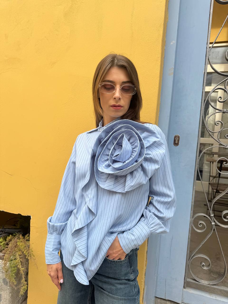 Blouse with floral appliqué