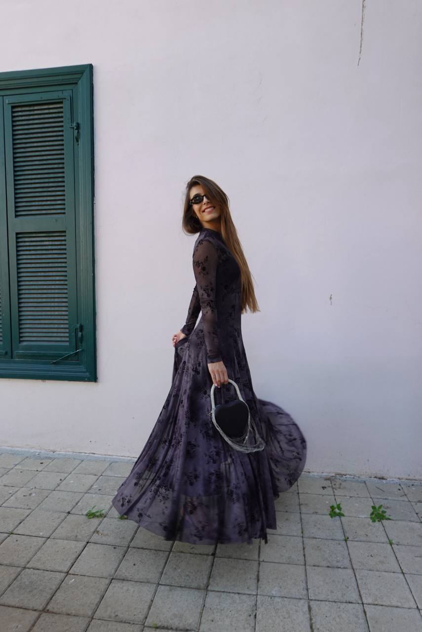 Long-sleeve sheer mesh maxi dress with a dark floral print
