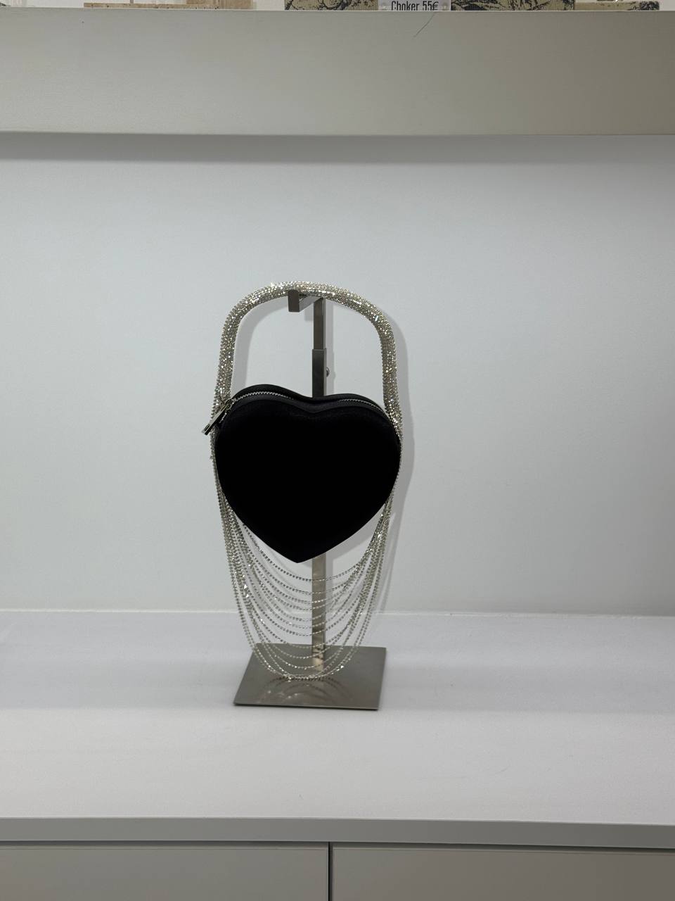Shiny black heart bag