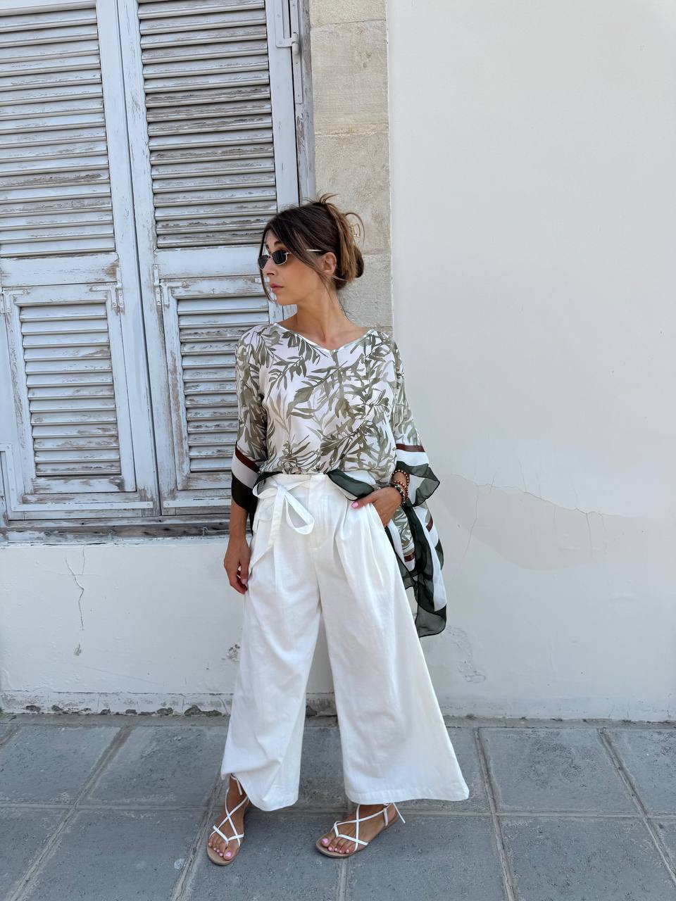 Flared white cotton trousers